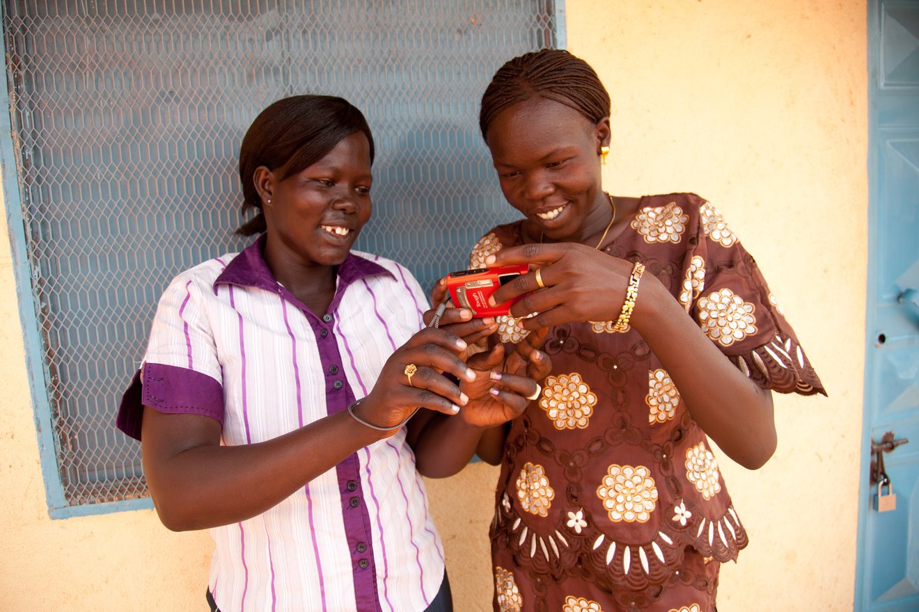 Kuajok, Warrap State, South Sudan. Saferworld Participatory Photography Project participants collecting images.